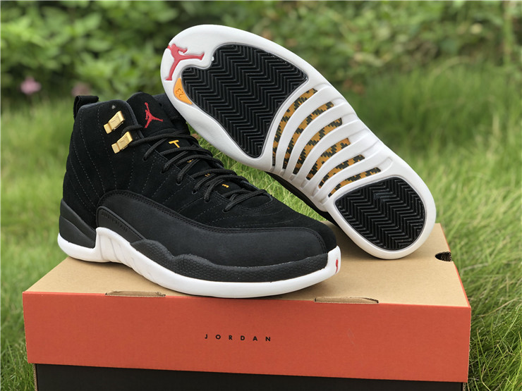 jordan 12 reverse taxi black white shoes